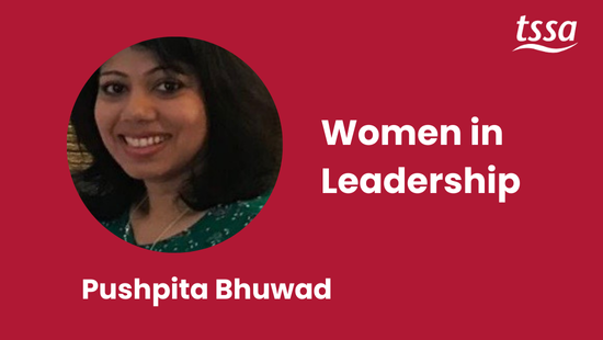 An asian woman smiling at the camera. She is wearing a green dress and has shoulder length hair. Text on the picture reads Women in Leadership, Pushpita Bhuwad.