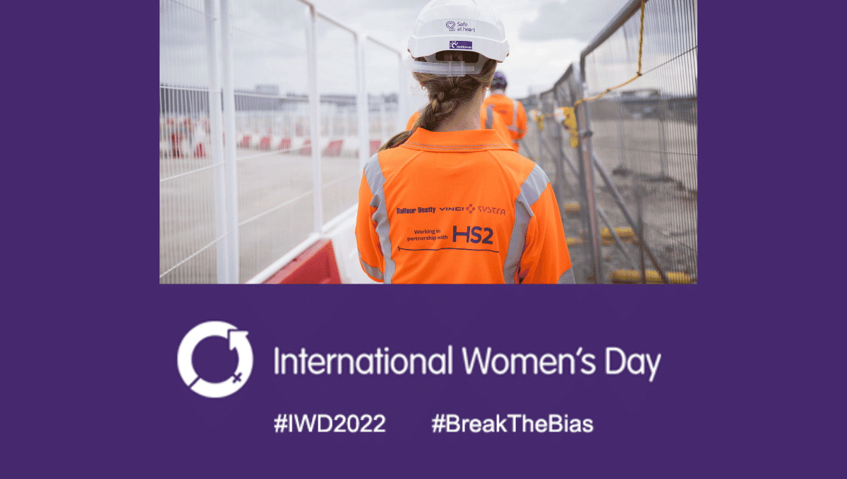 International Women's Day with back of a female HS2 engineer and #IWD2022 and #BreakTheBias