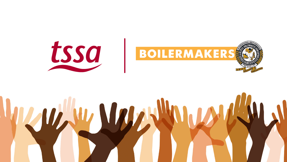 TSSA and Boilermakers logos above hands raised voting