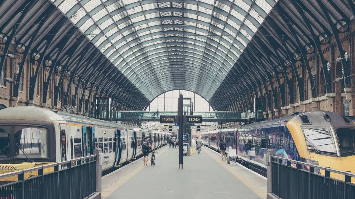 Kings Cross rail station London with two trains at platforms