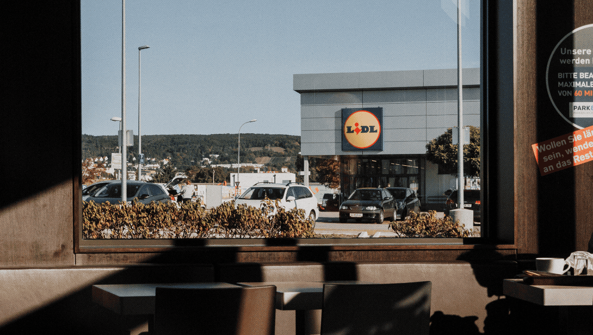 Exterior of a Lidl supermarket with cars parked