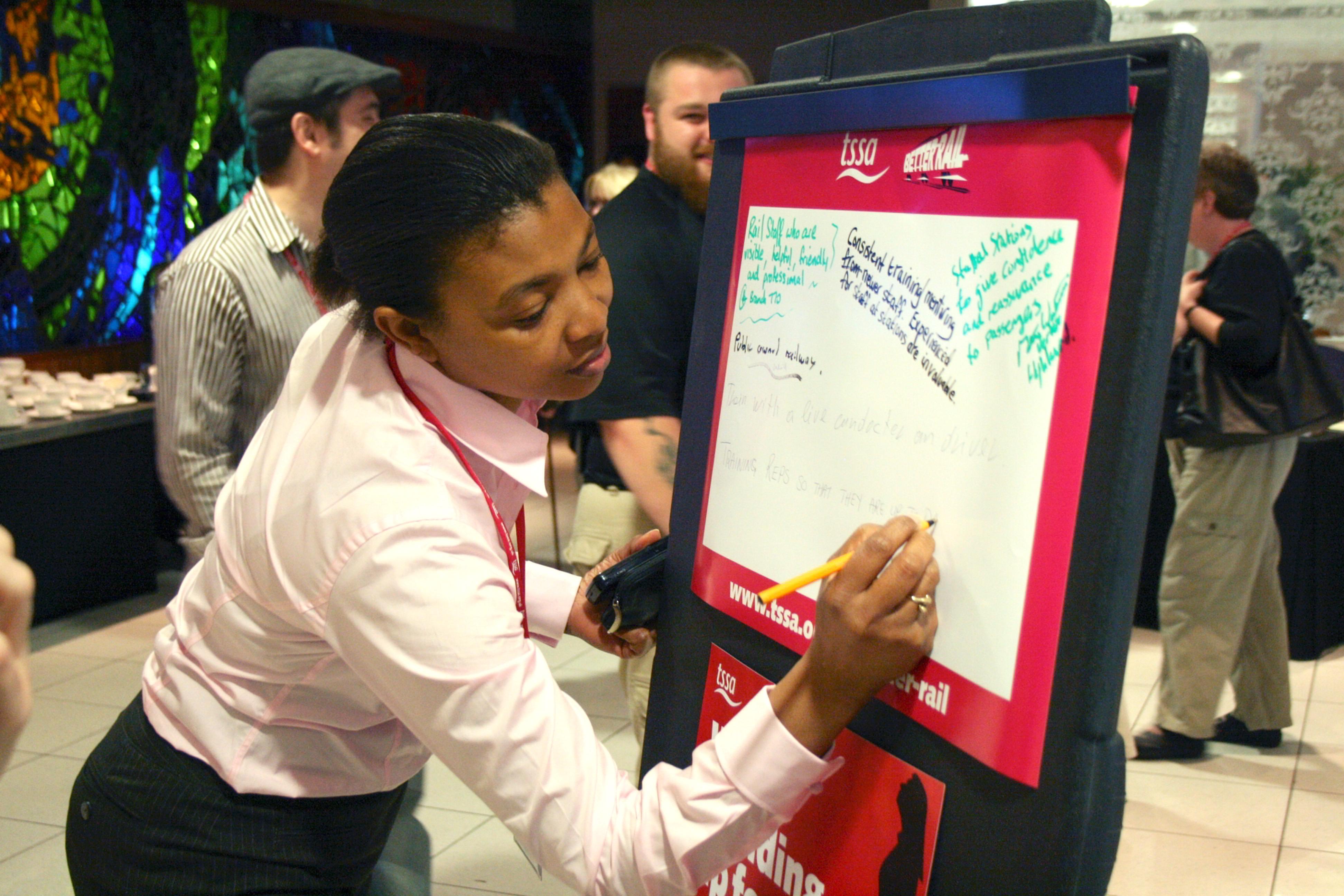 TSSA member writing on a flip chart