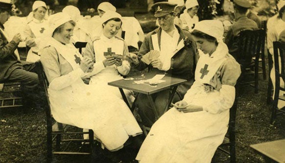 Nurses playing cards outside Cheadle Hulme Red Cross hospital, Cheshire.