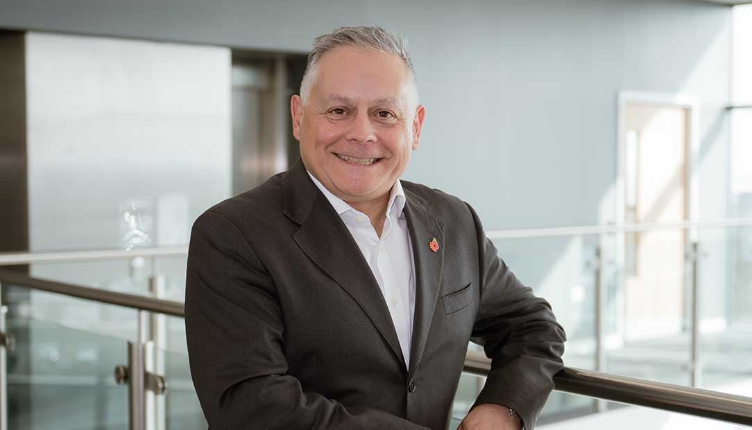 Board member, Paul Astruc, stood in the head office of Newcastle Building Society.