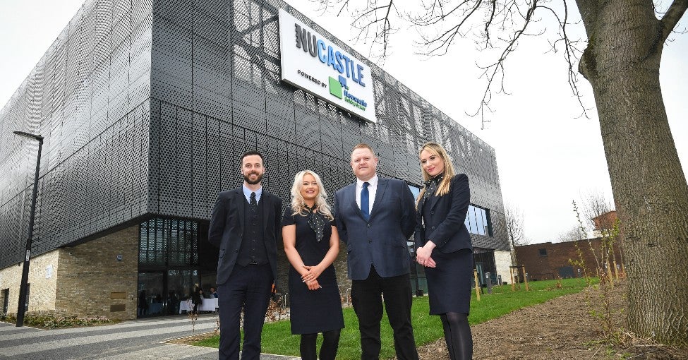 A group of branch colleagues stood outside Newcastle United Foundation's community hub, NUCASTLE powered by Newcastle Building Society.
