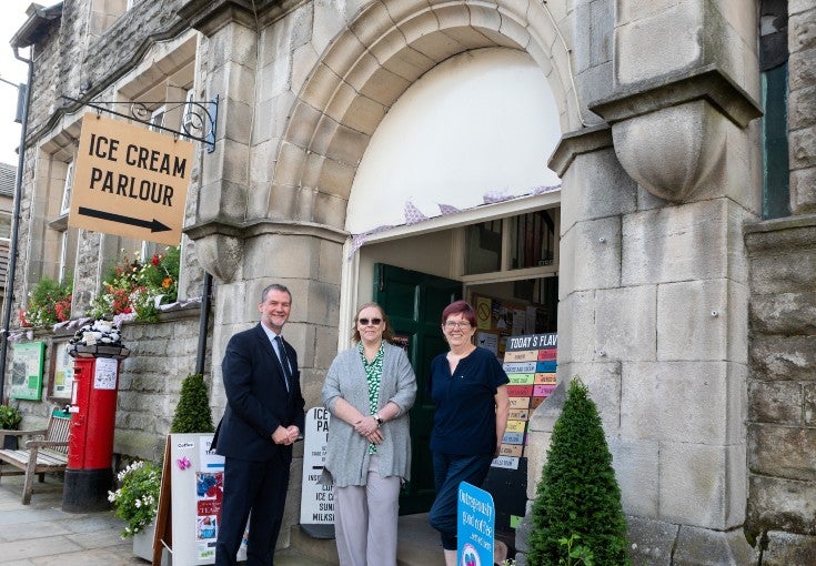 Our Hawes Branch Manager, Tim Larmour, outside of Market House with Abbie Rhodes from the Upper Dales Community Partnership and Laura Dunn from Market House. 