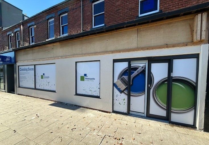 The outside of the Newcastle Building Society Hartlepool branch, with a coming soon sign displayed in the window.