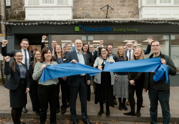 A group of Newcastle Building Society colleagues and local Pickering representatives getting ready for the ribbon cutting outside of the new Pickering branch.