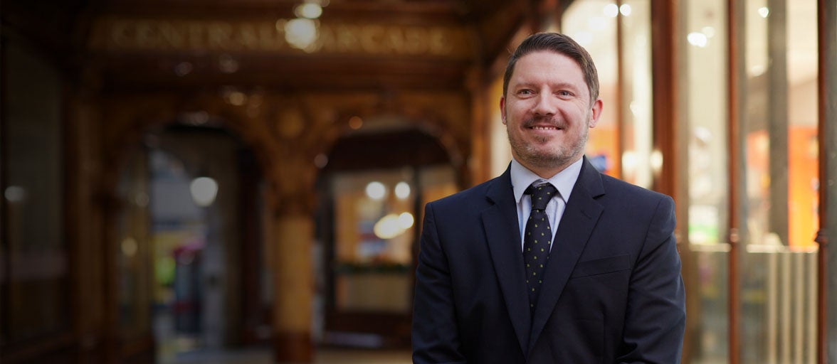 Northumberland Street's Branch Manager, Robert, stood in the central arcade. 