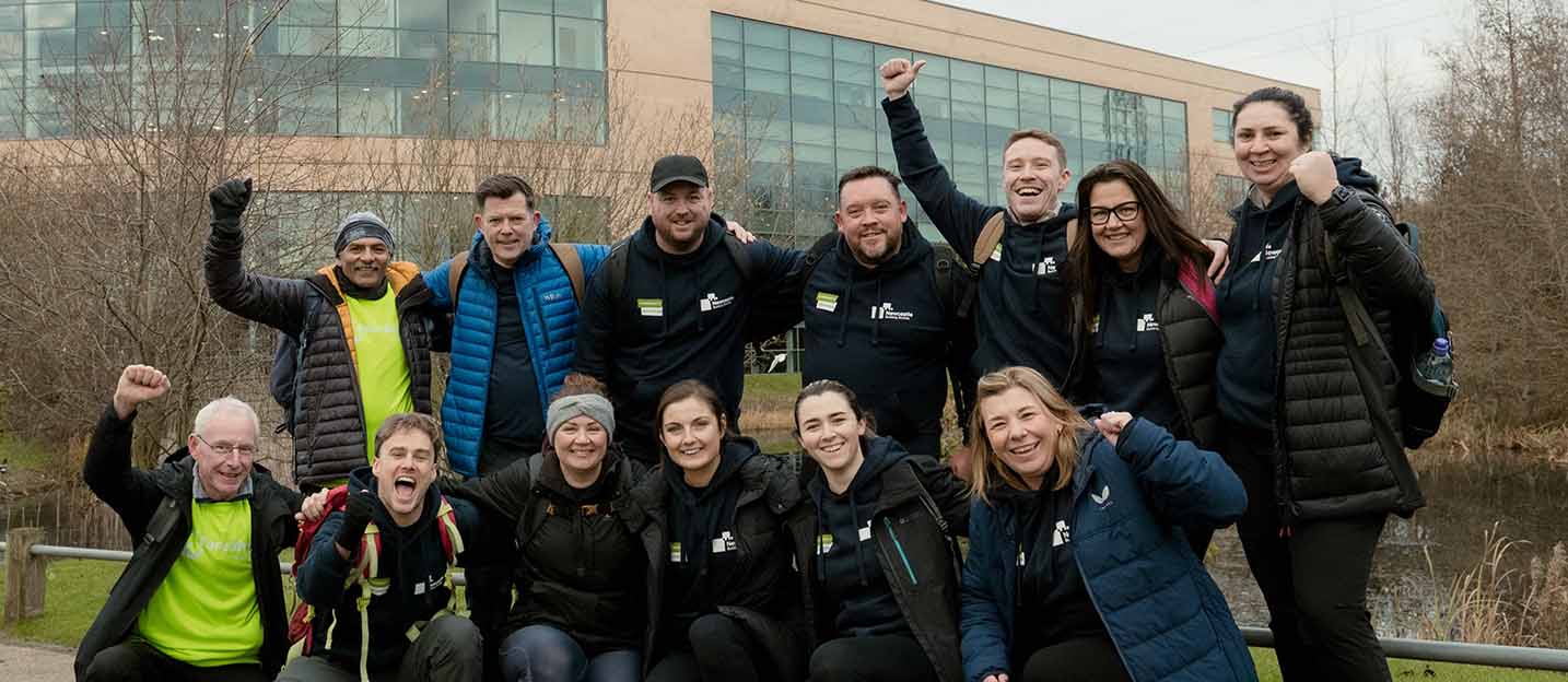 A group photo of Newcastle Building Society colleagues as they finish their charity walk. 