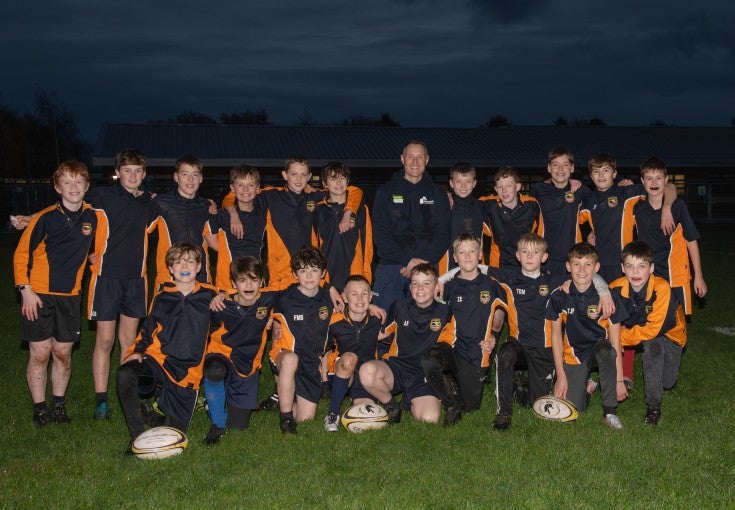 The Gosforth Central Middle School after-school rugby squad and their coach, Paul Edwards. 