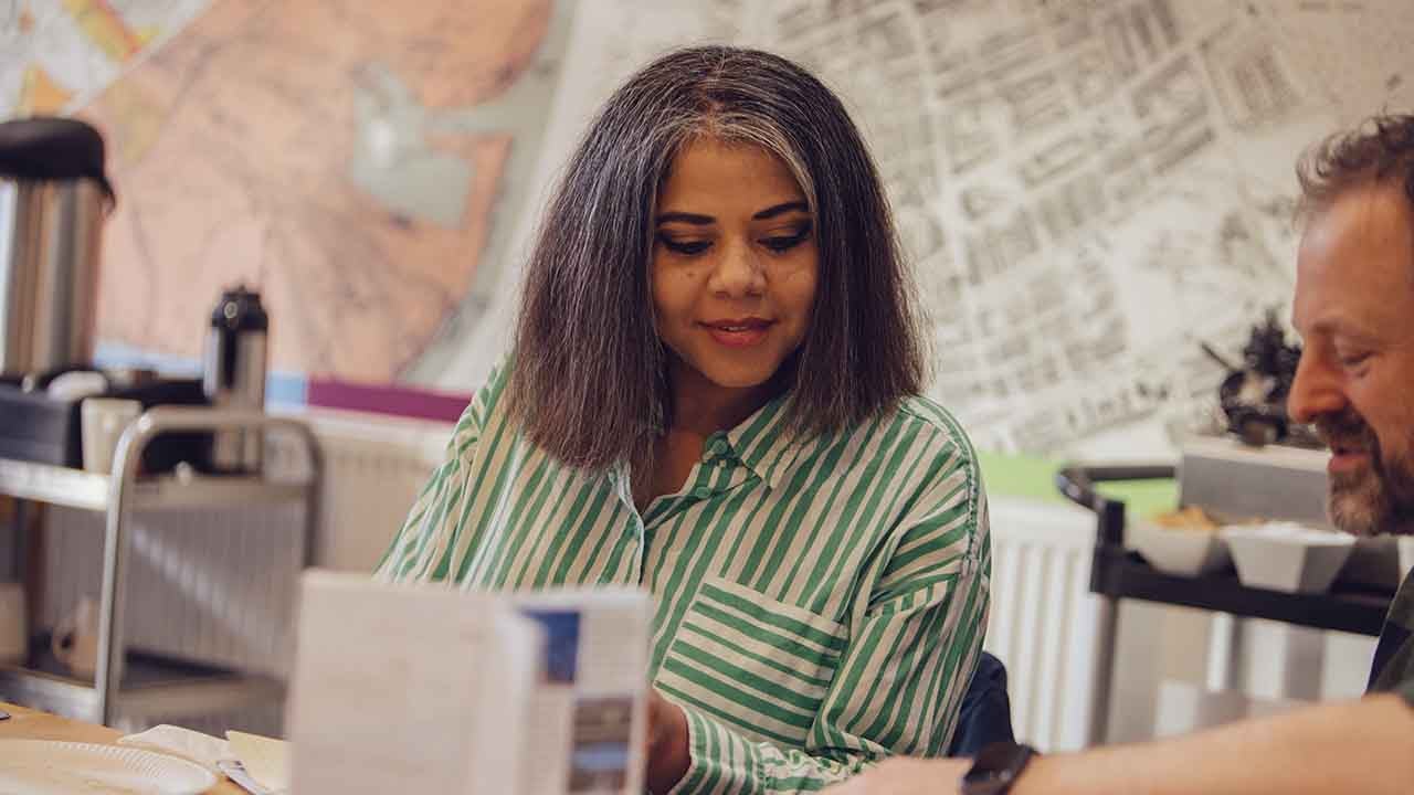 A woman sitting at a desk