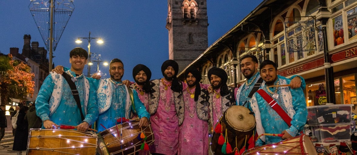 A group of men holding drums during the Darlington Diwali parade.