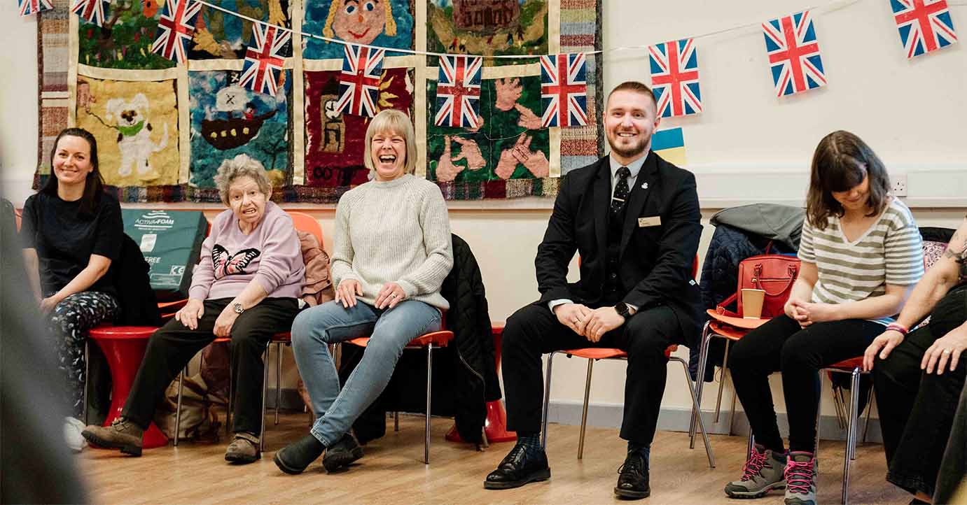 Newcastle Building Society colleague sat with members of the North Tyneside Disability Forum