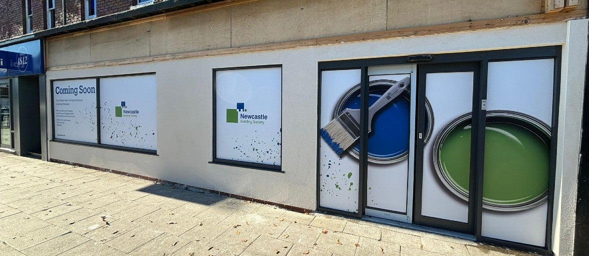 The outside of the Newcastle Building Society Hartlepool branch, with a coming soon sign displayed in the window.