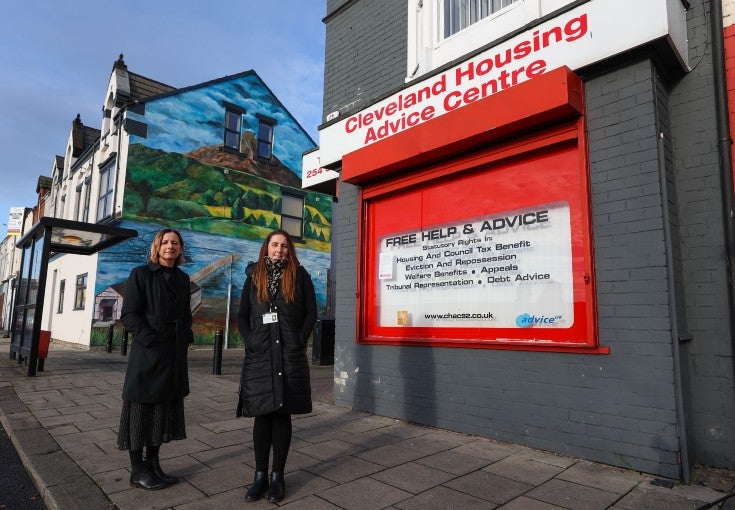 Two ladies stood facing the camera, outside Cleveland Housing Advice Centre in Middlesbrough.