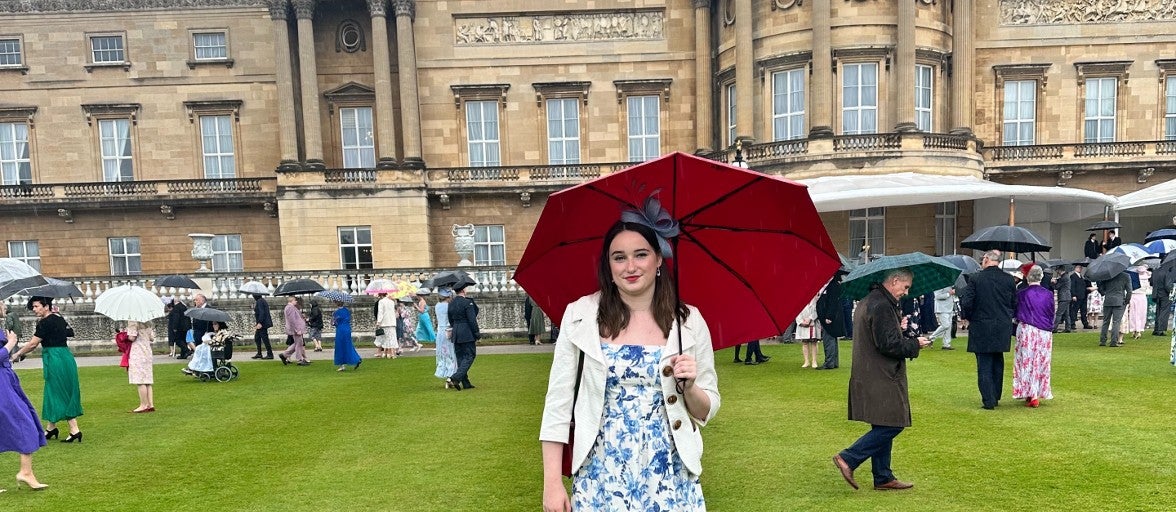 A colleague attending a Royal Garden Party at Buckingham Palace.