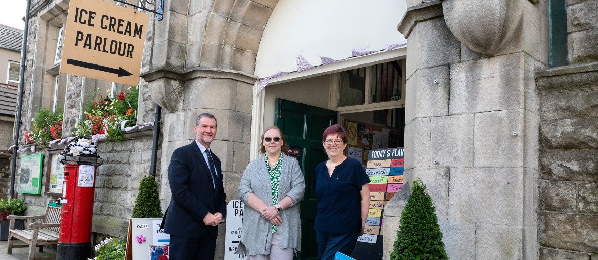 Our Hawes Branch Manager, Tim Larmour, outside of Market House with Abbie Rhodes from the Upper Dales Community Partnership and Laura Dunn from Market House.