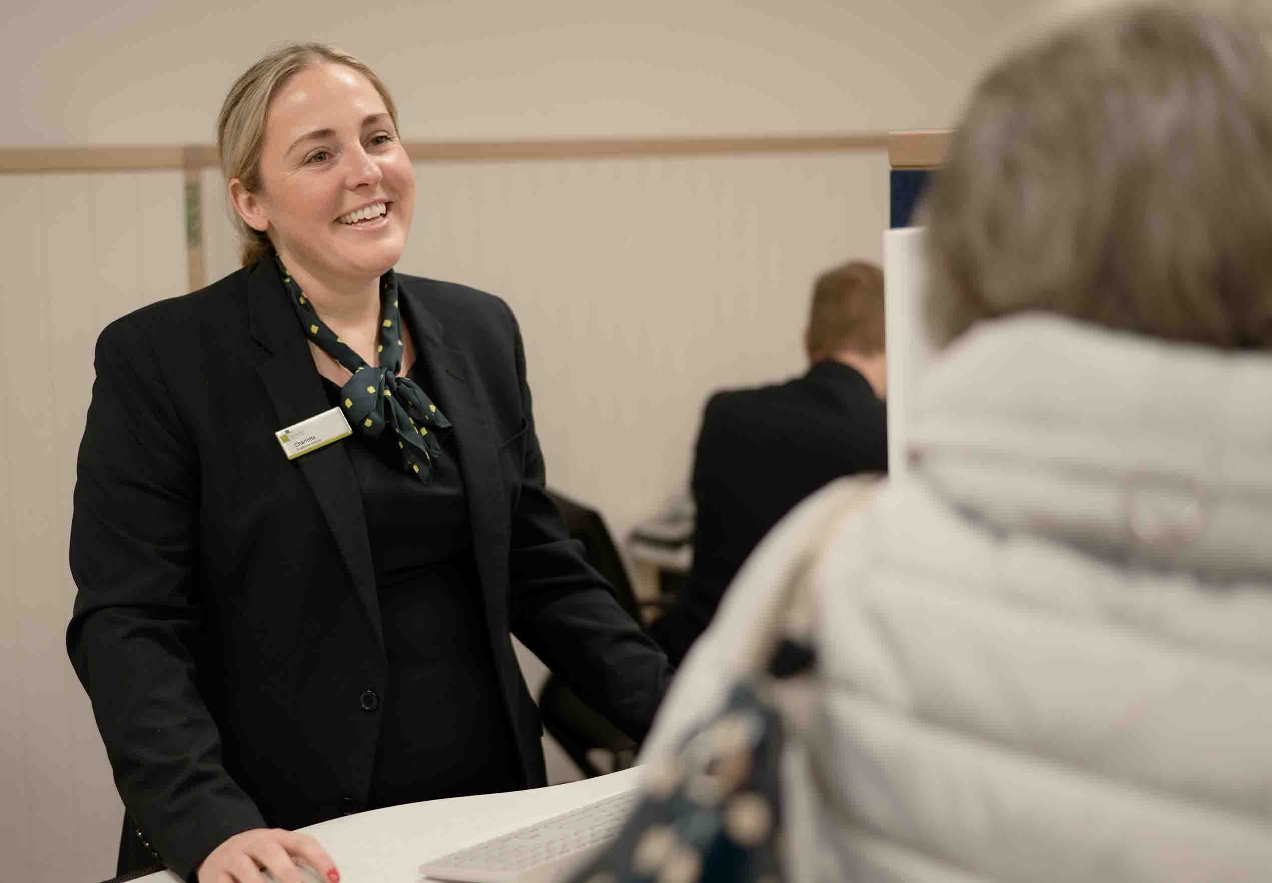 A branch colleague serving a customer in the Hartlepool branch. 