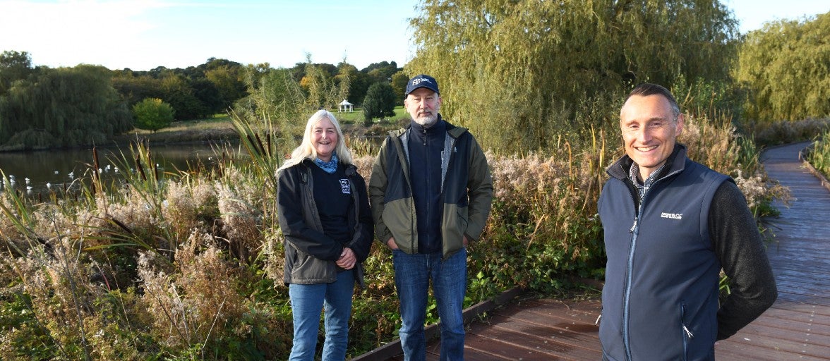 Mandy Bell and John Cokill of Durham Wildlife Trust stood with Paul Edwards, Head of Enterprise Risk at Newcastle Building Society, near Shibdon Pond