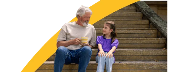 A man and girl sitting on stairs