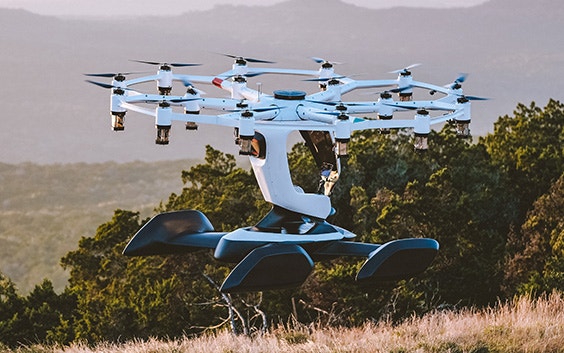 LIFT's HEXA aircraft flying unmanned above a field