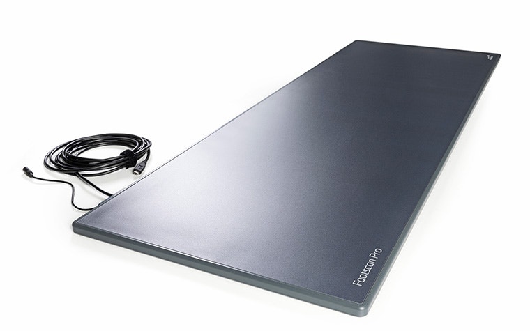 A full-length shot of the Materialise Footscan Pro Level pressure plate against a white backdrop.