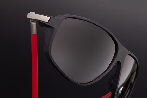 View of the hinge on a pair of McLaren sunglasses, showing the unique closure
