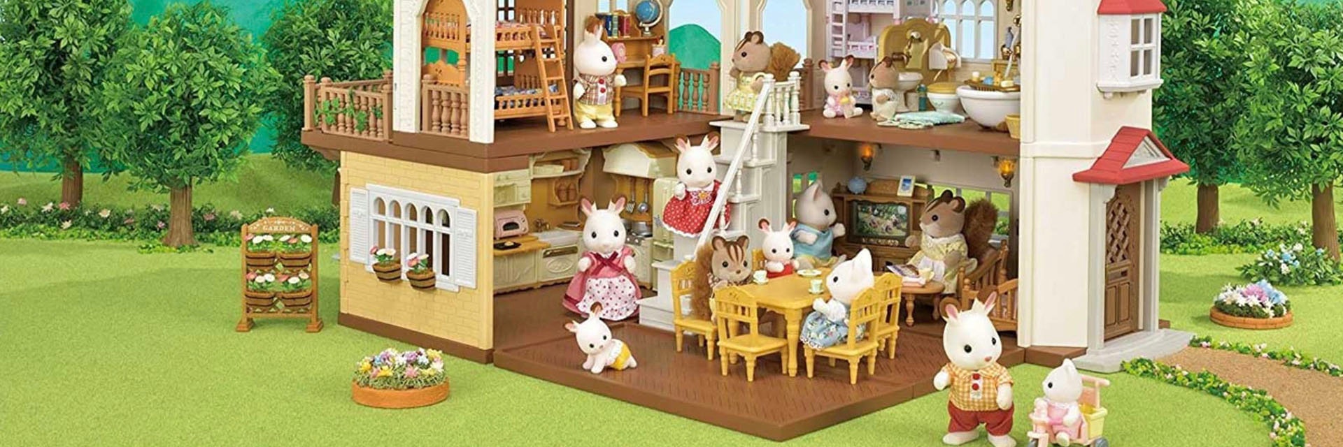 Toy house with many animal figurines inside