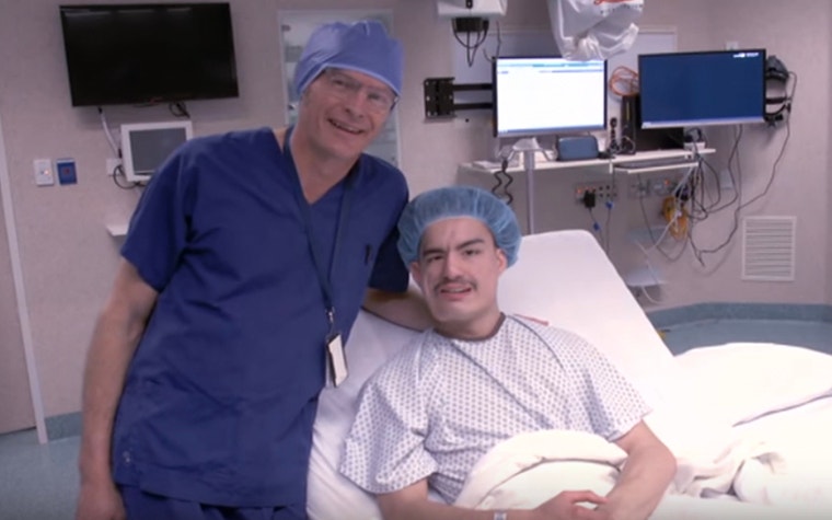 Dr. Goodisson and Carlos posing in hospital before the life-changing surgery. 