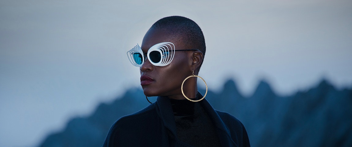 Model wearing 3D-printed unique, layered JF Rey sunglasses 