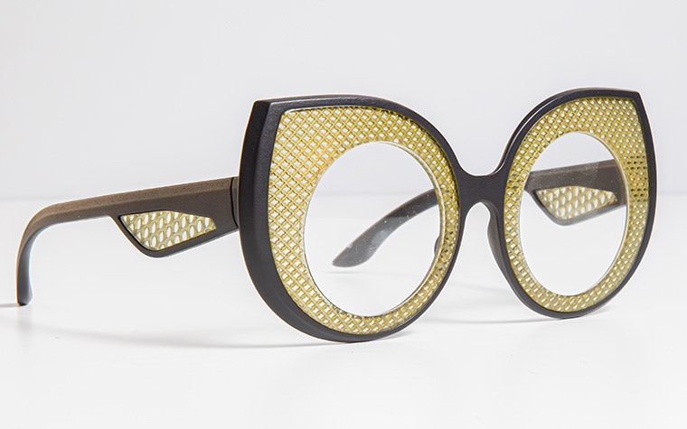Black and gold 3D-printed eyewear made with Materialise's new translucent material.
