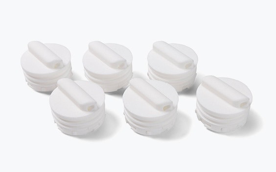 Six round 3D-printed parts for Sartorius' spectroport, made in PA 12 using SLS.