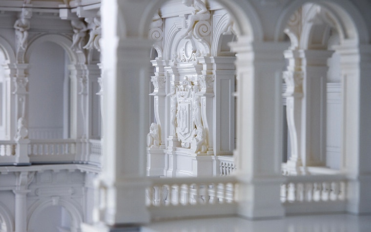 Close-up showing intricate detail of the inside of a model of Antwerp City Hall