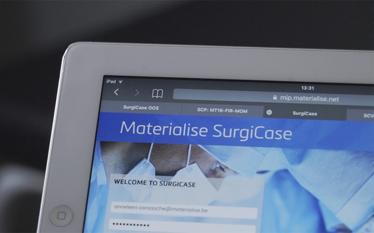 The Materialise SurgiCase login screen shown on a tablet