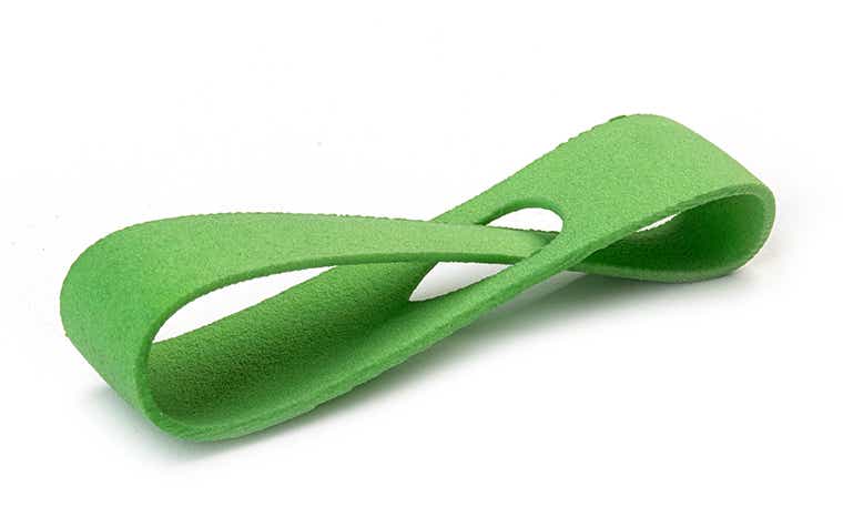 Bucle de muestra mate impreso en 3D en PA-GF y teñido en verde.