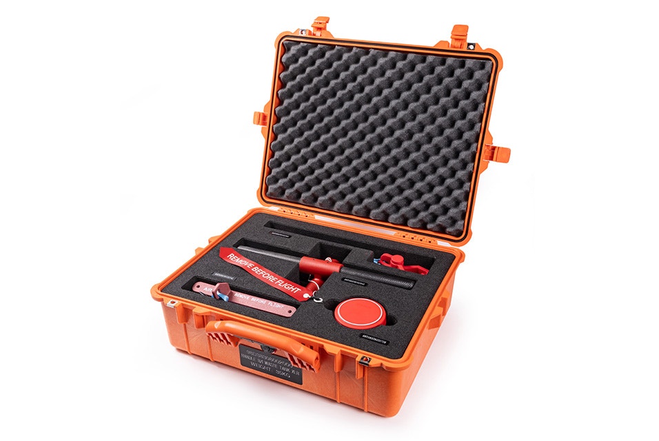 A plastic orange case filled with foam padding and 3D-printed tools for an Airbus waste tank.