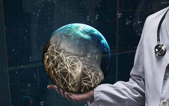 Doctor holding a digital image of the world, half of it looking similar to an STL file