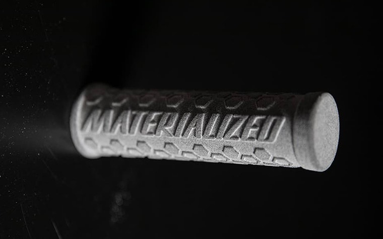 3D-printed TPU handle with "Materialized" embossed on the side
