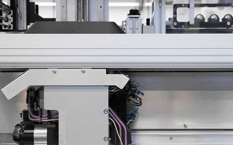 Component of the Labman Formulation Machine that allows the robotic arm to move laterally