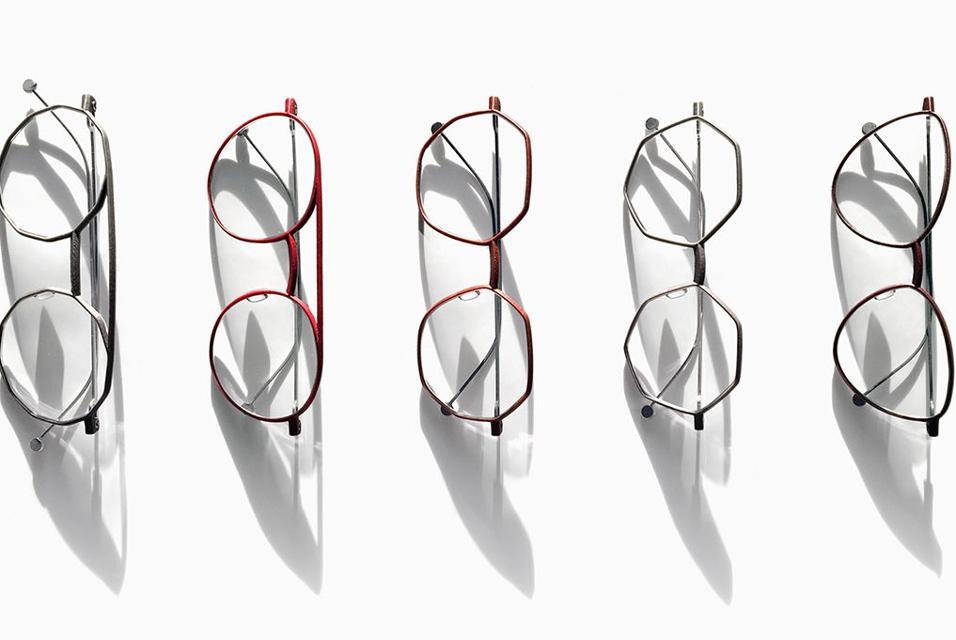 Eyeglasses lined up in a row