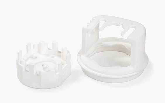 A white 3D-printed tool made in PA 12 Medical-Grade using selective laser sintering.