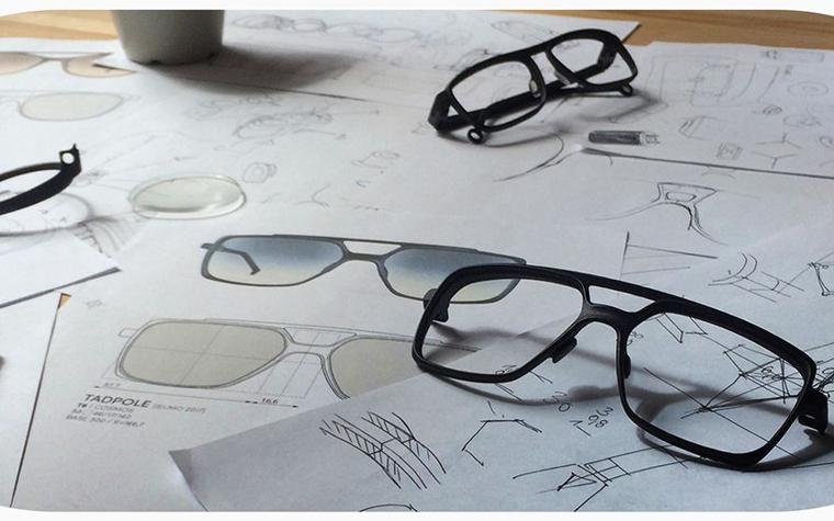 Eyewear frames on tops of drawn designs