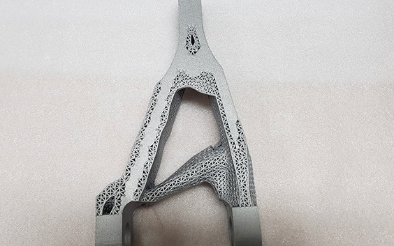 Triangular metal 3D-printed aerospace part with lattice structure 