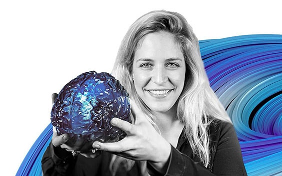 Woman holding a 3D-printed brain model