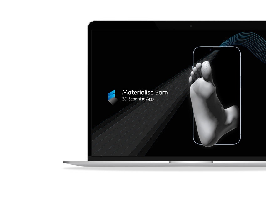 Laptop screen with the Materialise SAM logo and a smart phone outline with a 3D model of a foot sticking out