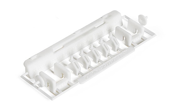 A 3D-printed repair kits with EASA 21.J quality labels. The kit contains small white plastic parts made of flame-retardant polyamide, designed by Expleo. These parts are used to replace commonly broken latches on Boeing 737 dado panels. 