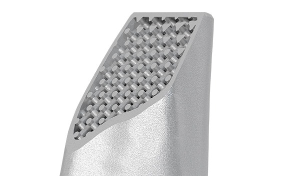 Metal 3D-printed part with a cross-section to show internal structures