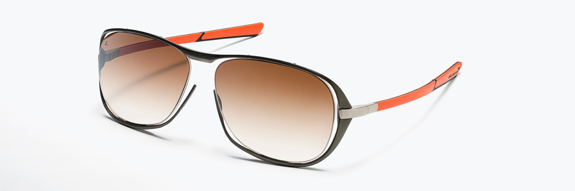 Close-up of red and black McLaren 3D-printed sunglasses from the McLaren Vision Collection