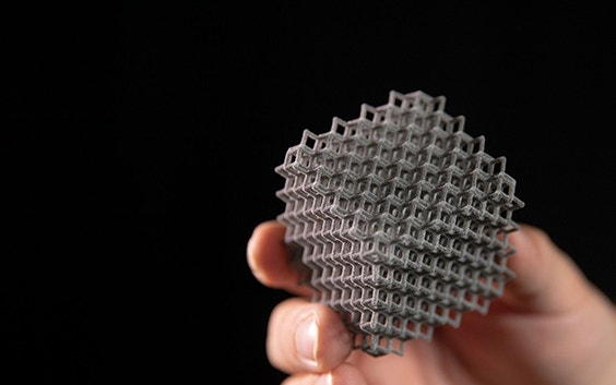 Geometric shape 3D printed in TPU against a black background
